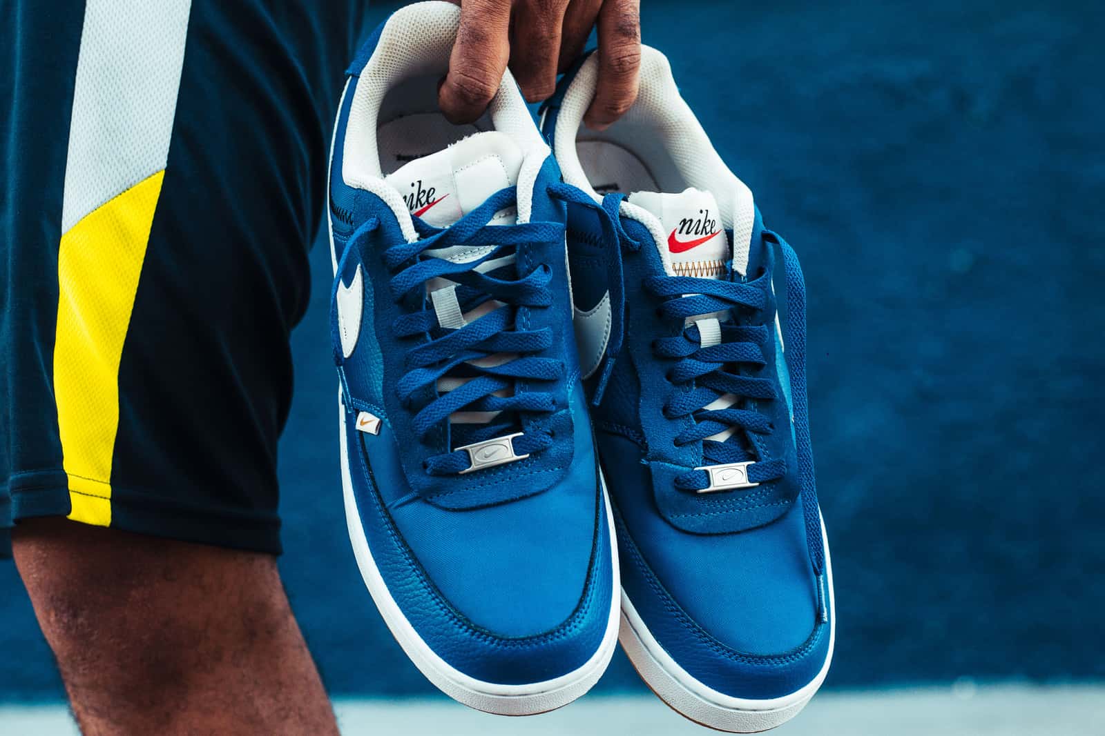 Court shoes on a clean, light-toned pickleball court